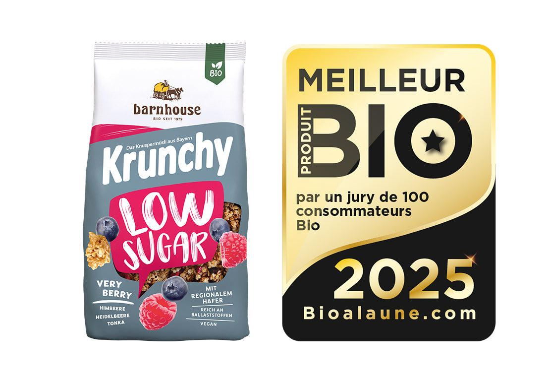 Packshot von Krunchy Low Sugar Very Berry, daneben das Siegel für "Bestes Bio 2025" in Frankreich.
