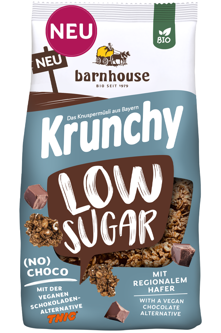 Packshot vom blau-braunen Beutel Krunchy Low Sugar (No) Choco von Bio-Knuspermüsli-Hersteller Barnhouse mit Neu-Button