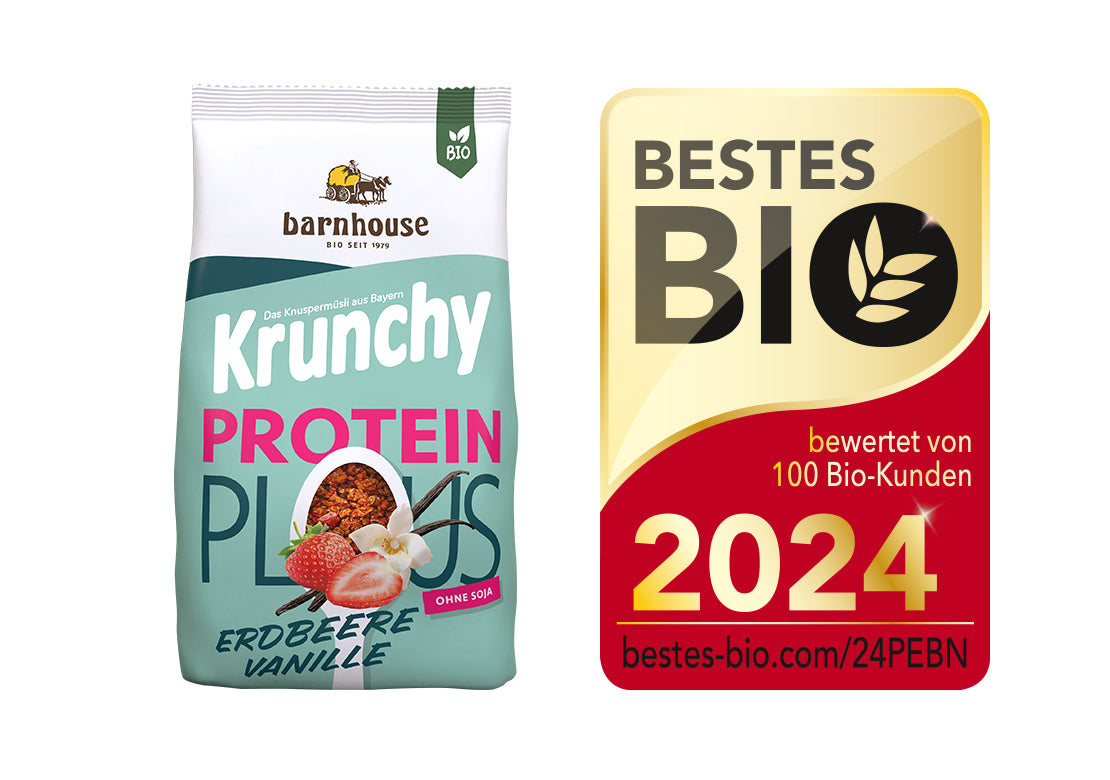 Packshot von Krunchy Plus Protein, daneben das Siegel für "Bestes Bio 2024".