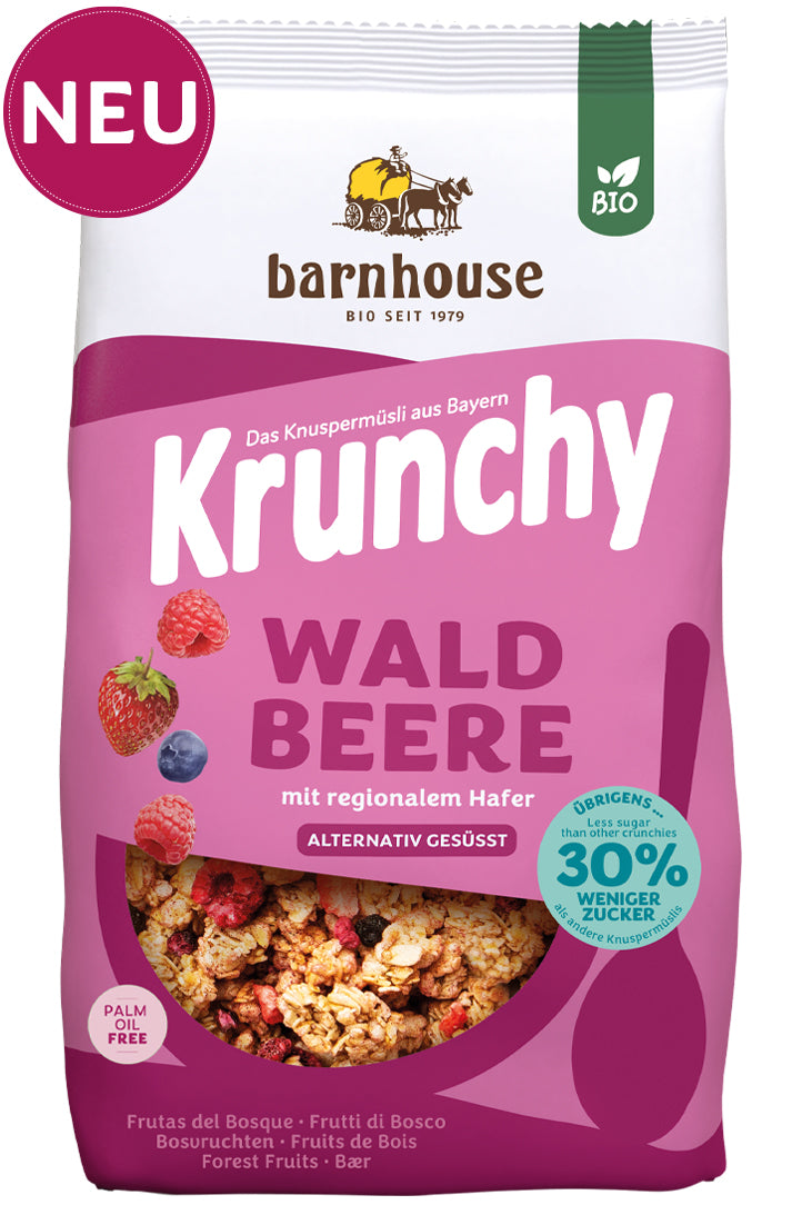 Packshot vom beerenfarbenen Beutel Krunchy Waldbeere weniger Zucker von Bio-Knuspermüsli-Hersteller Barnhouse mit Neu-Button