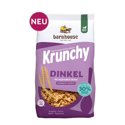 Packshot vom lila Beutel Krunchy Dinkel weniger Zucker von Bio-Knuspermüsli-Hersteller Barnhouse mit Neu-Button